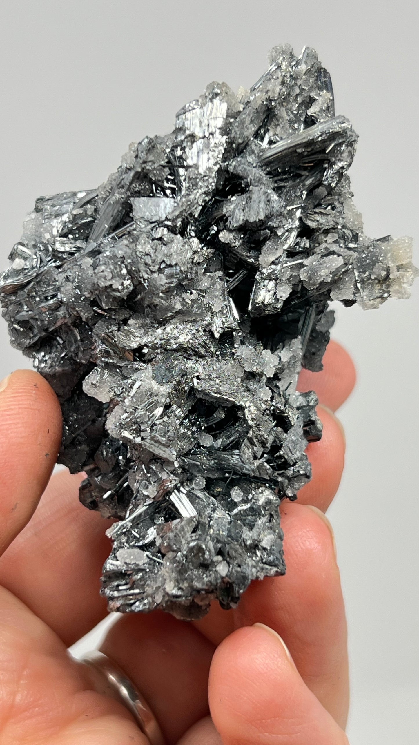 Prismatic Stibnite Cluster with Chalcedony Druse