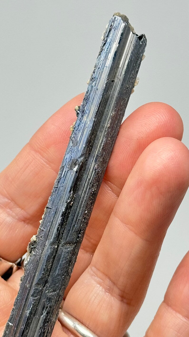 Prismatic Stibnite Blade with Calcite