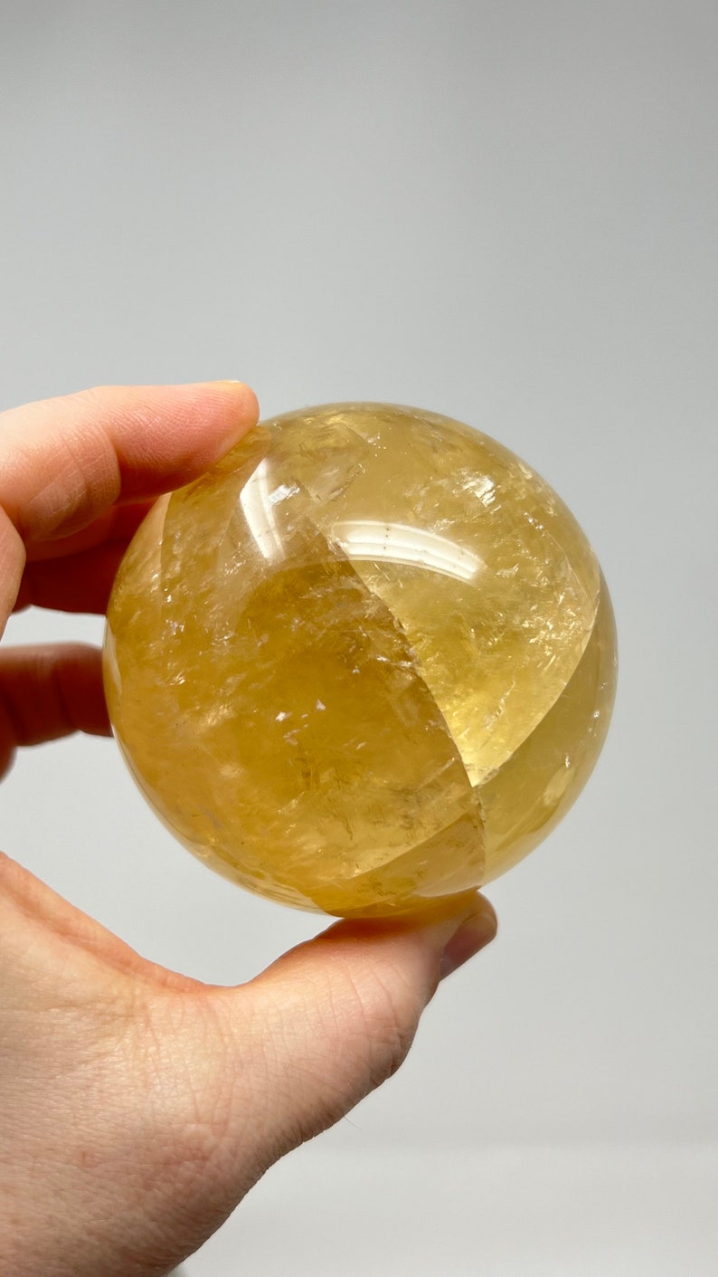 Golden Calcite Sphere with Stand, 546g Bolivia