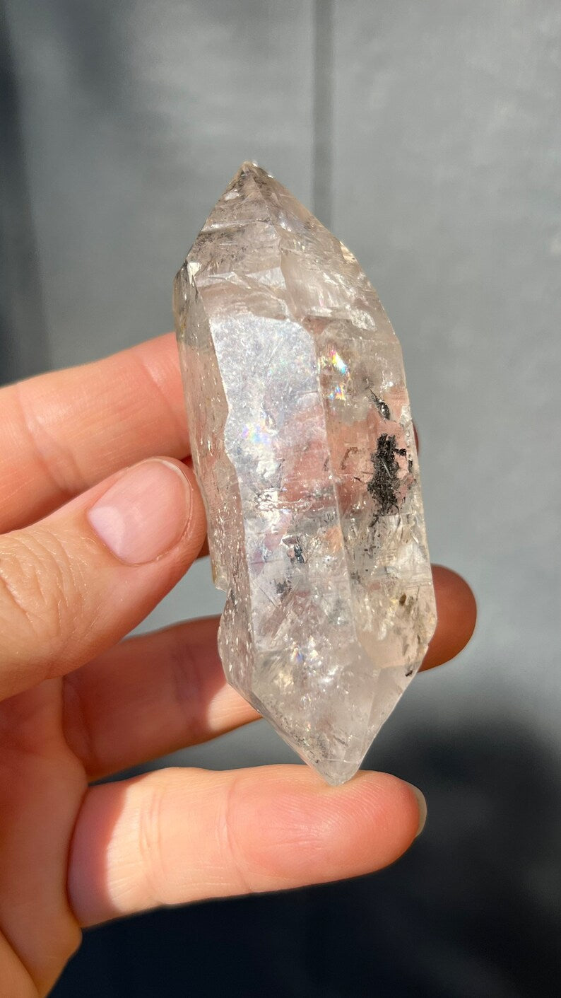Manifestation Tibetan Quartz with Carbon Pockets and Rainbows, 99g Tibet Nepal