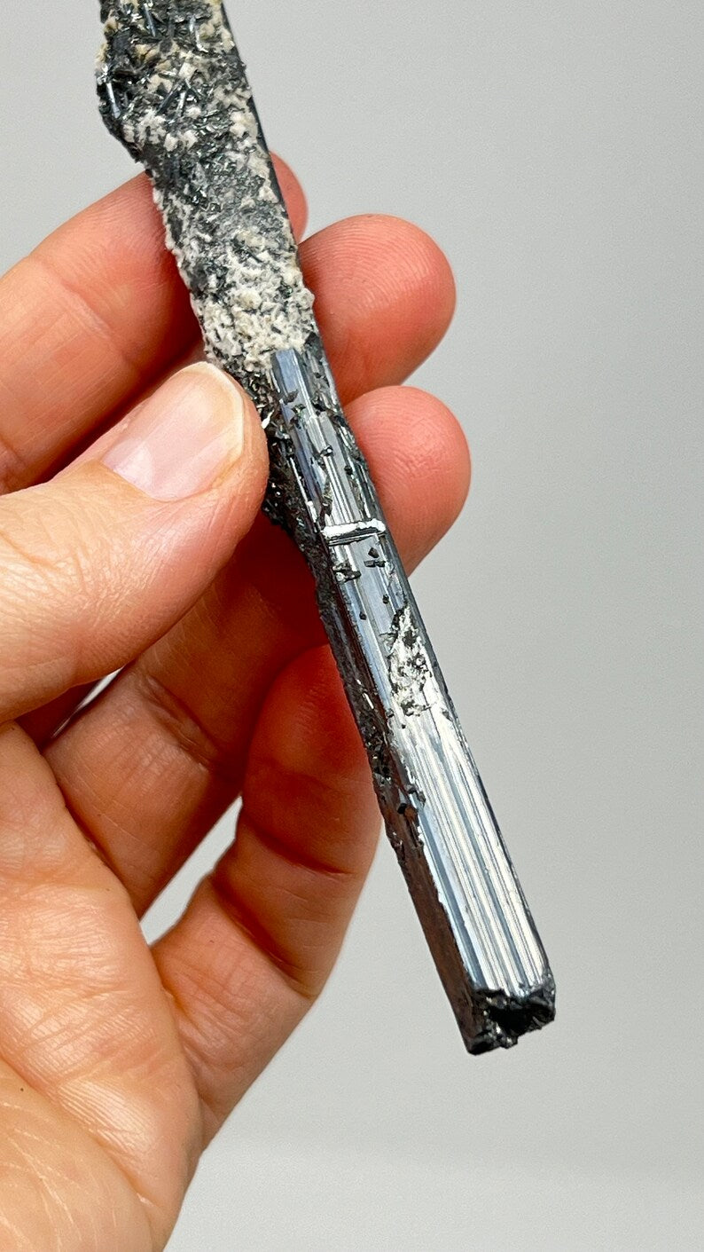 Prismatic Stibnite Blade with Calcite