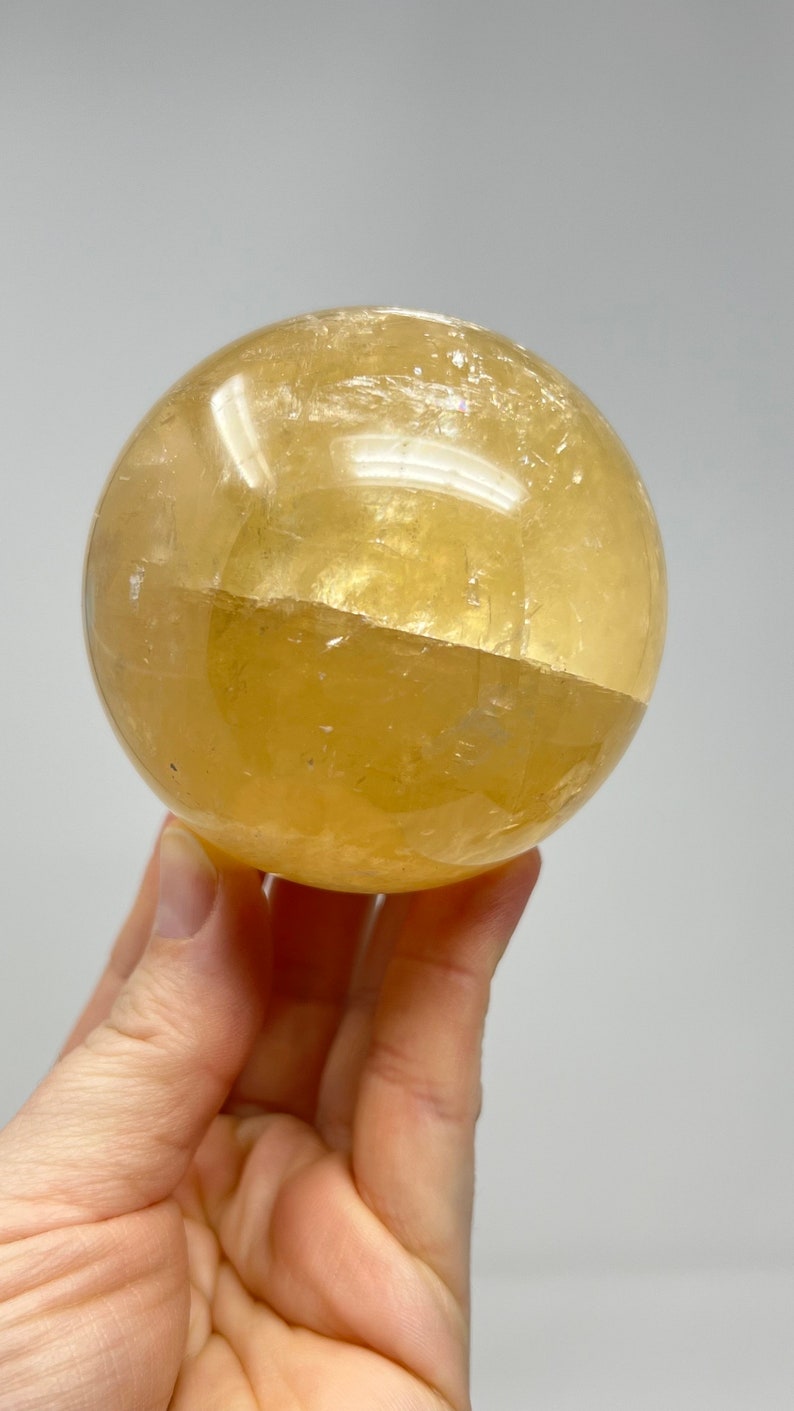 Golden Calcite Sphere with Stand, 546g Bolivia