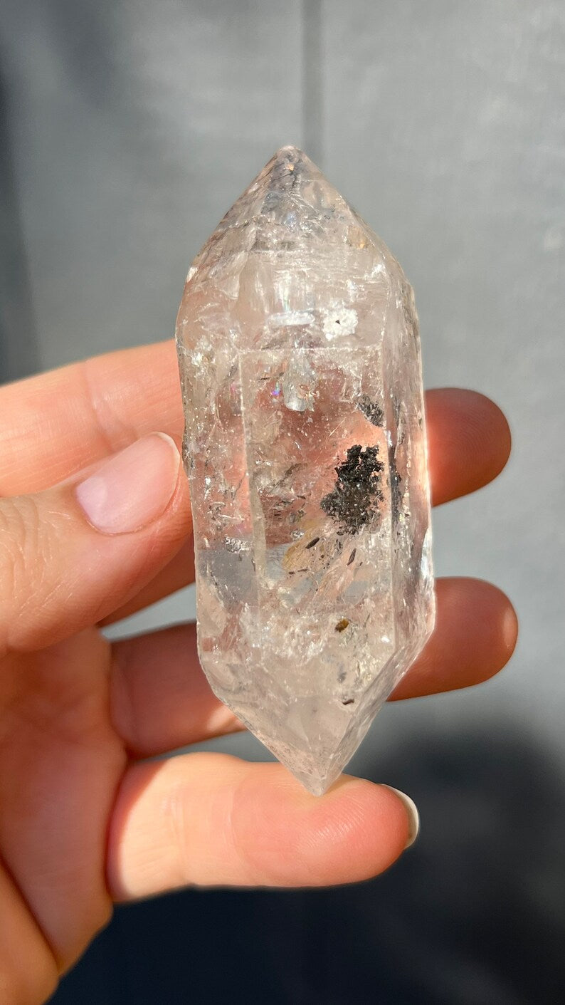 Manifestation Tibetan Quartz with Carbon Pockets and Rainbows, 99g Tibet Nepal