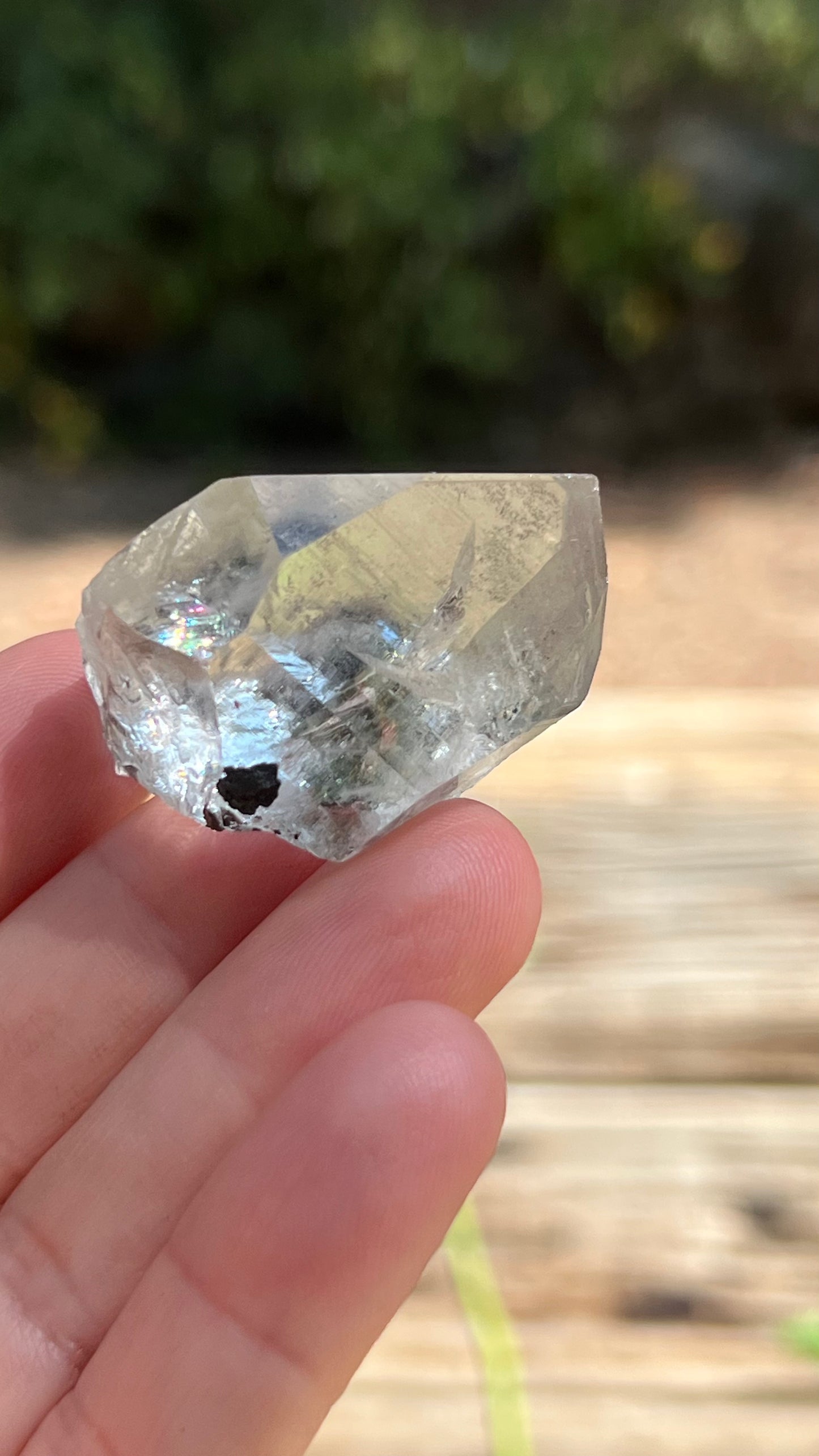 Quartz Point with Pyrite, Hematite and Rainbows