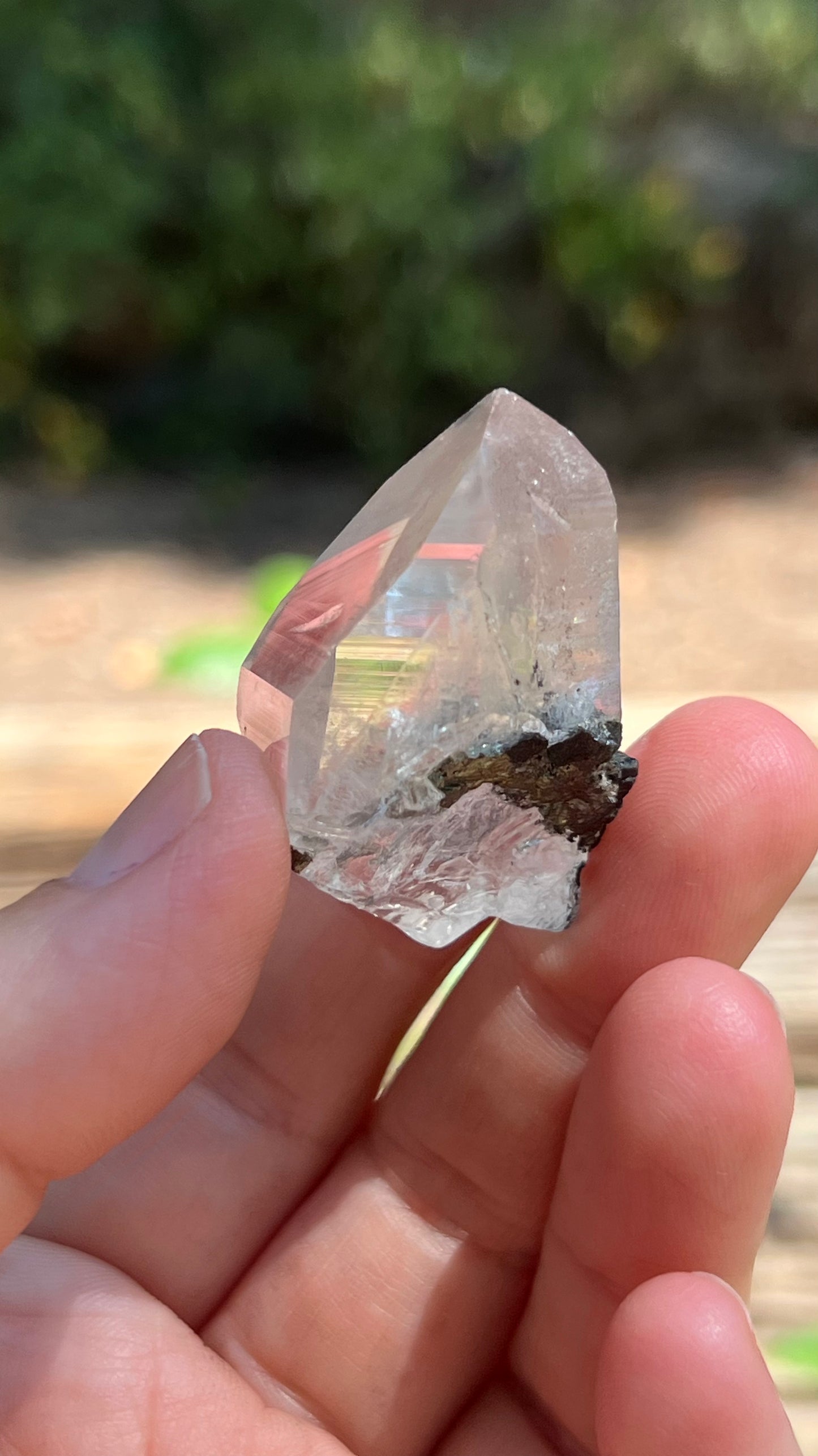 Quartz Point with Pyrite, Hematite and Rainbows