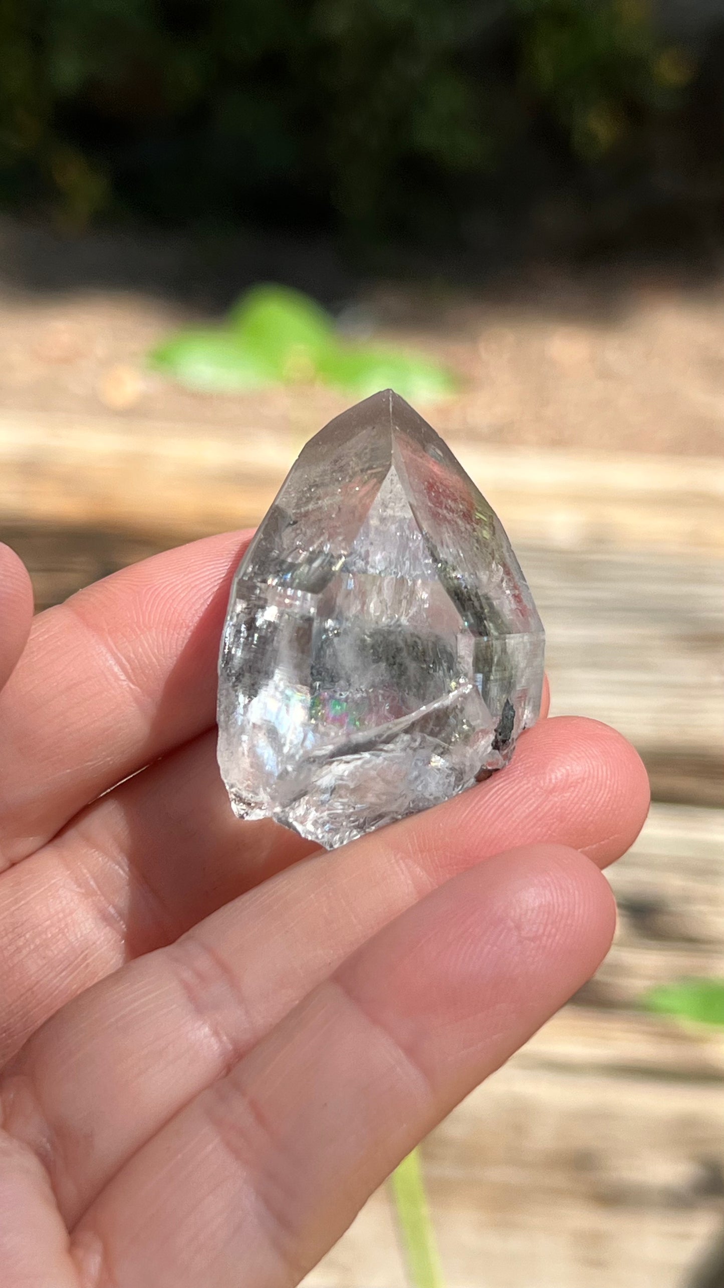 Quartz Point with Pyrite, Hematite and Rainbows