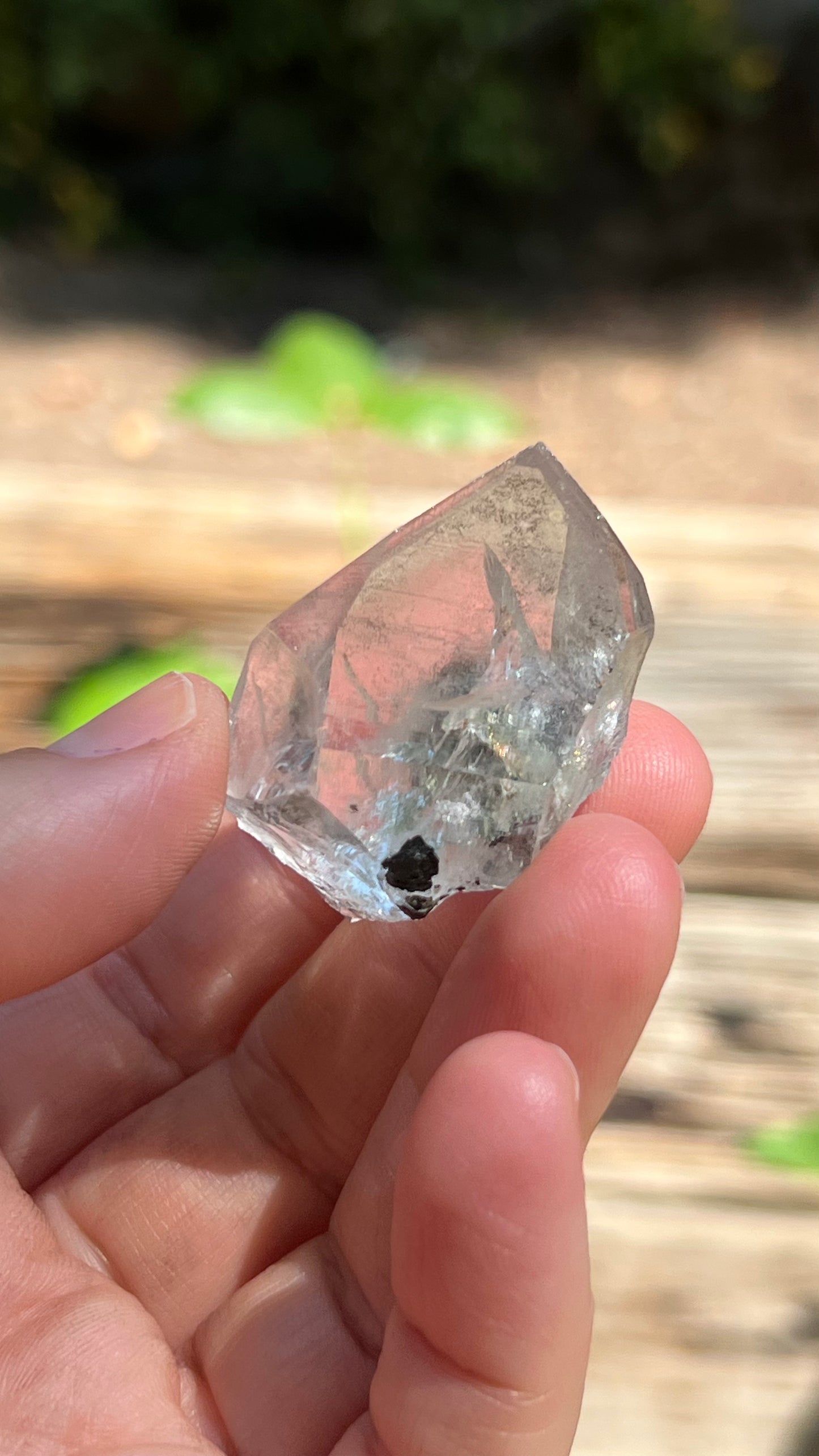 Quartz Point with Pyrite, Hematite and Rainbows