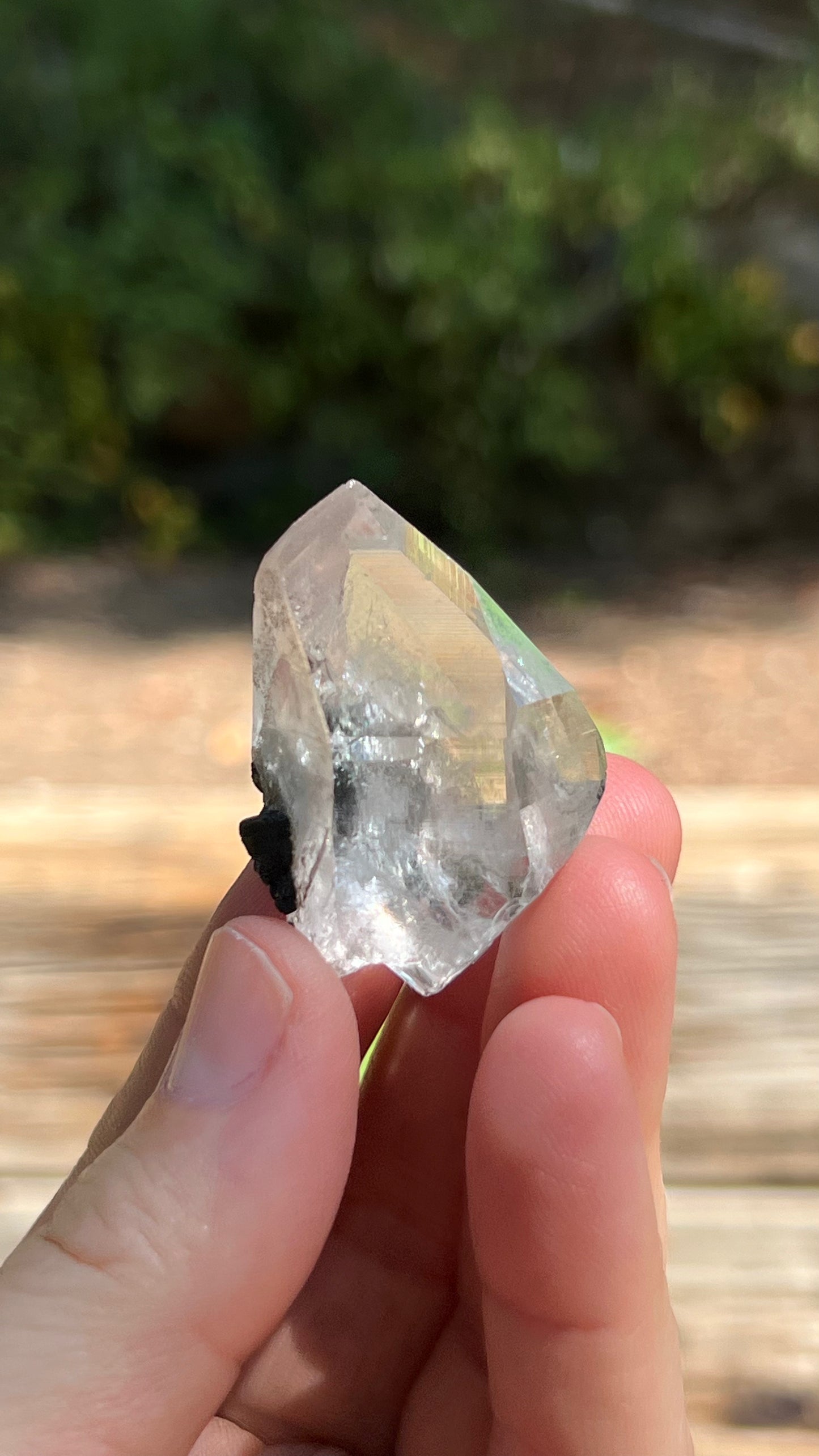 Quartz Point with Pyrite, Hematite and Rainbows