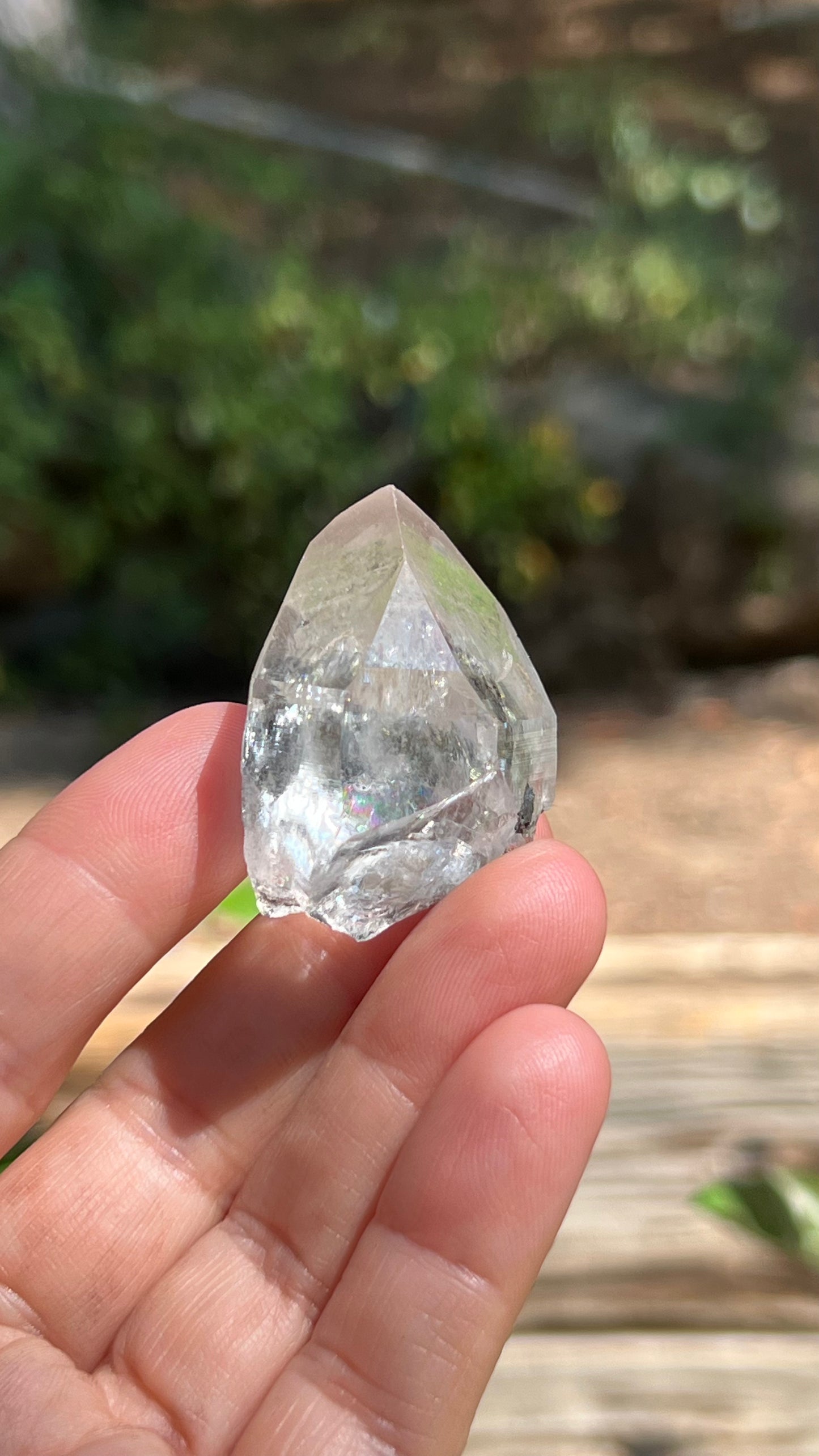 Quartz Point with Pyrite, Hematite and Rainbows