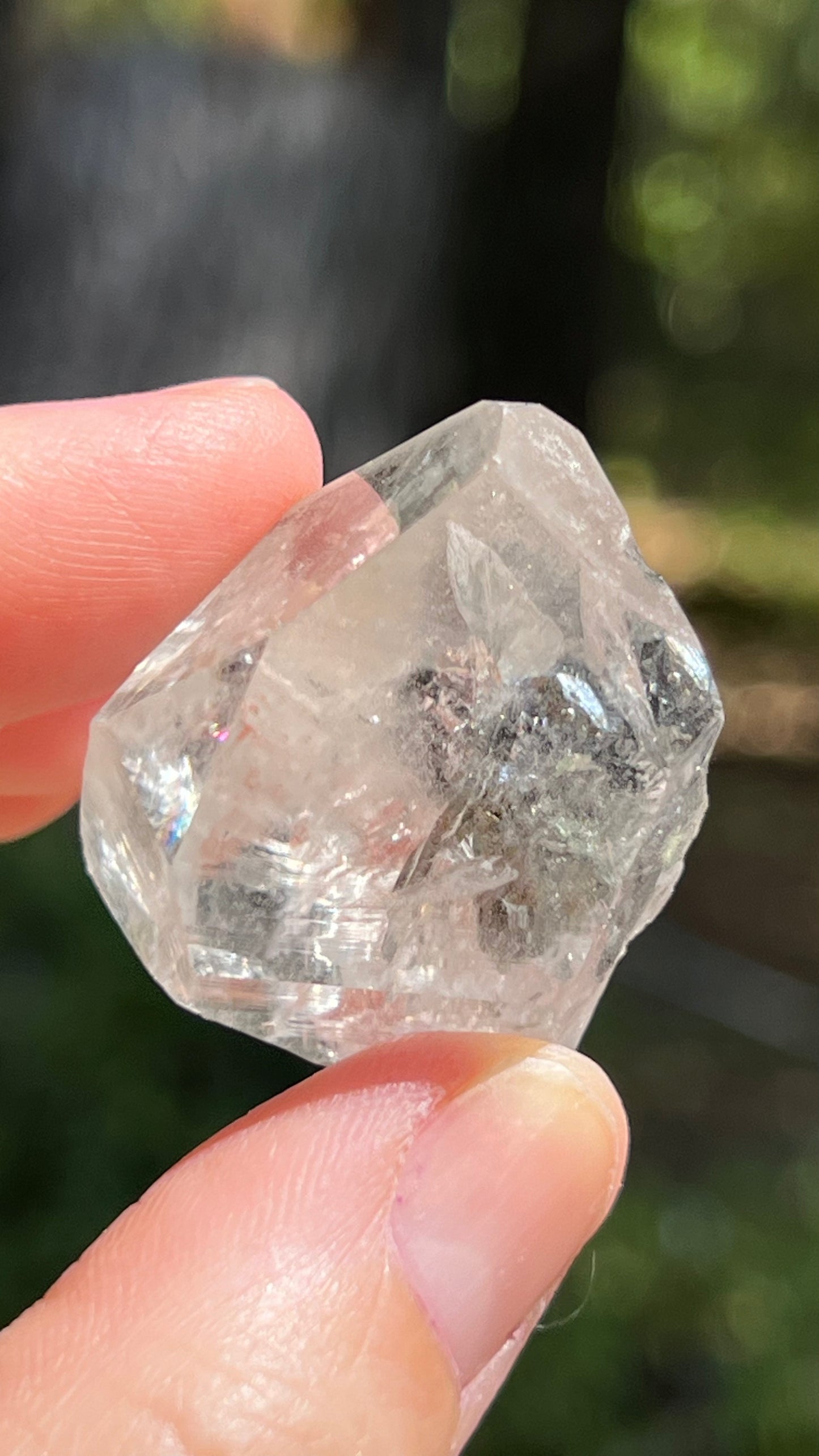 Quartz Point with Pyrite, Hematite and Rainbows