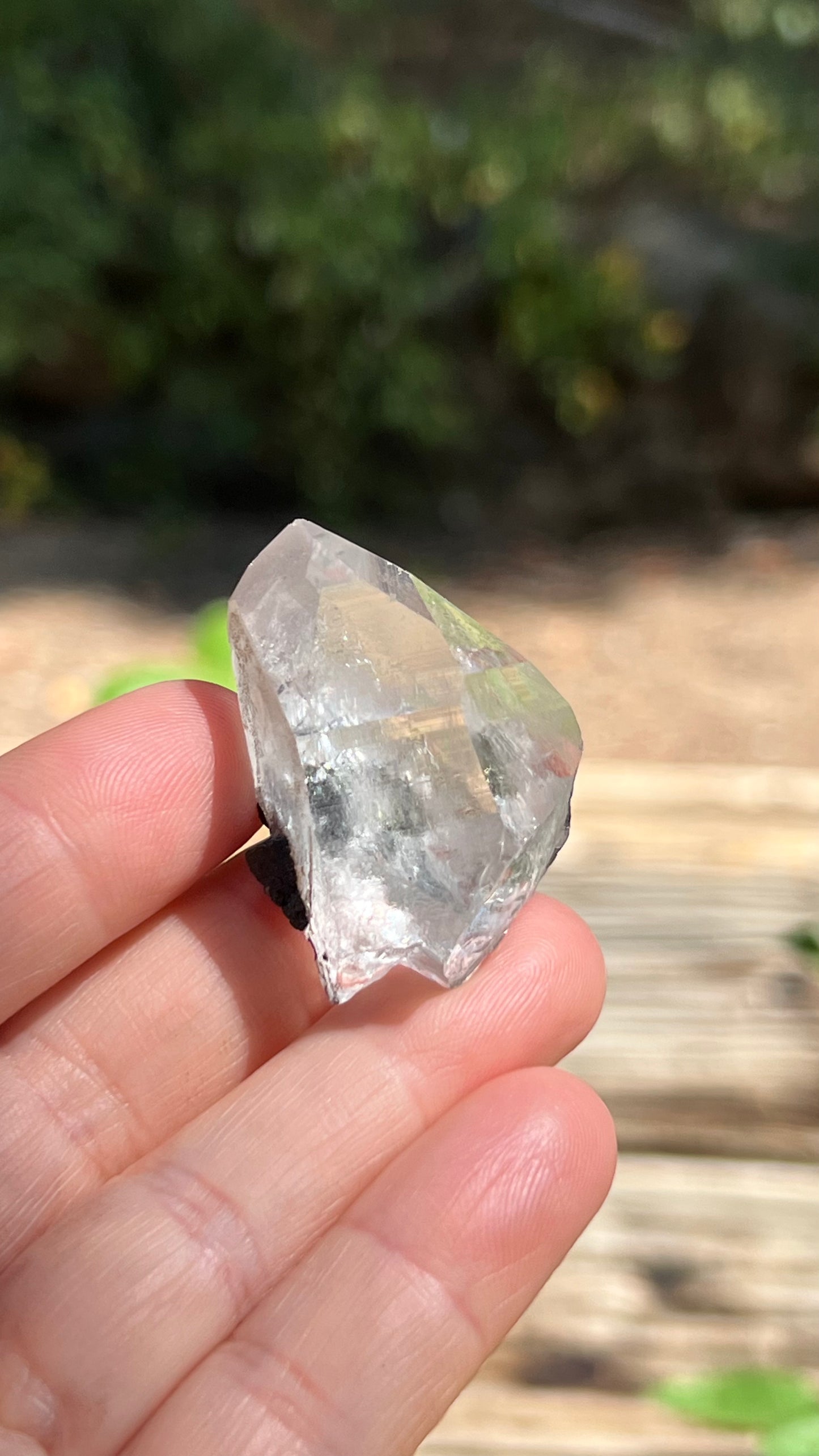 Quartz Point with Pyrite, Hematite and Rainbows