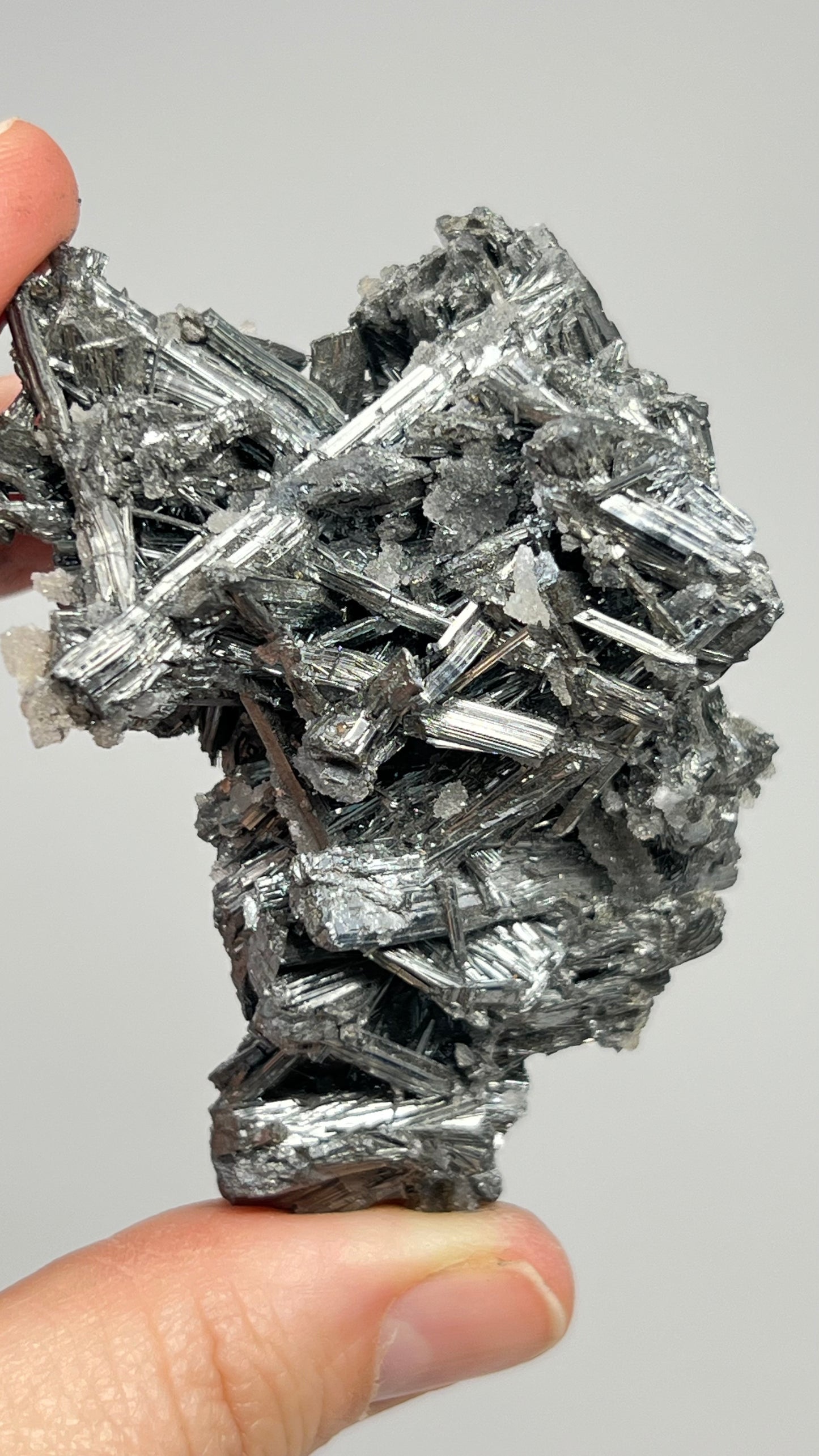 Prismatic Stibnite Cluster with Chalcedony Druse