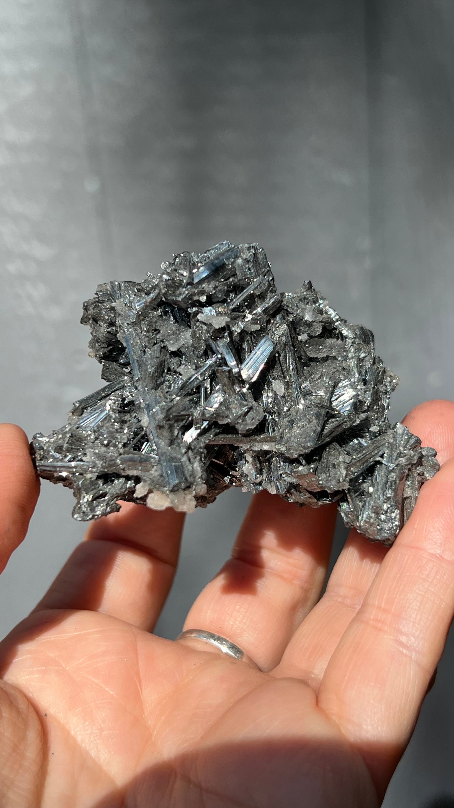 Prismatic Stibnite Cluster with Chalcedony Druse