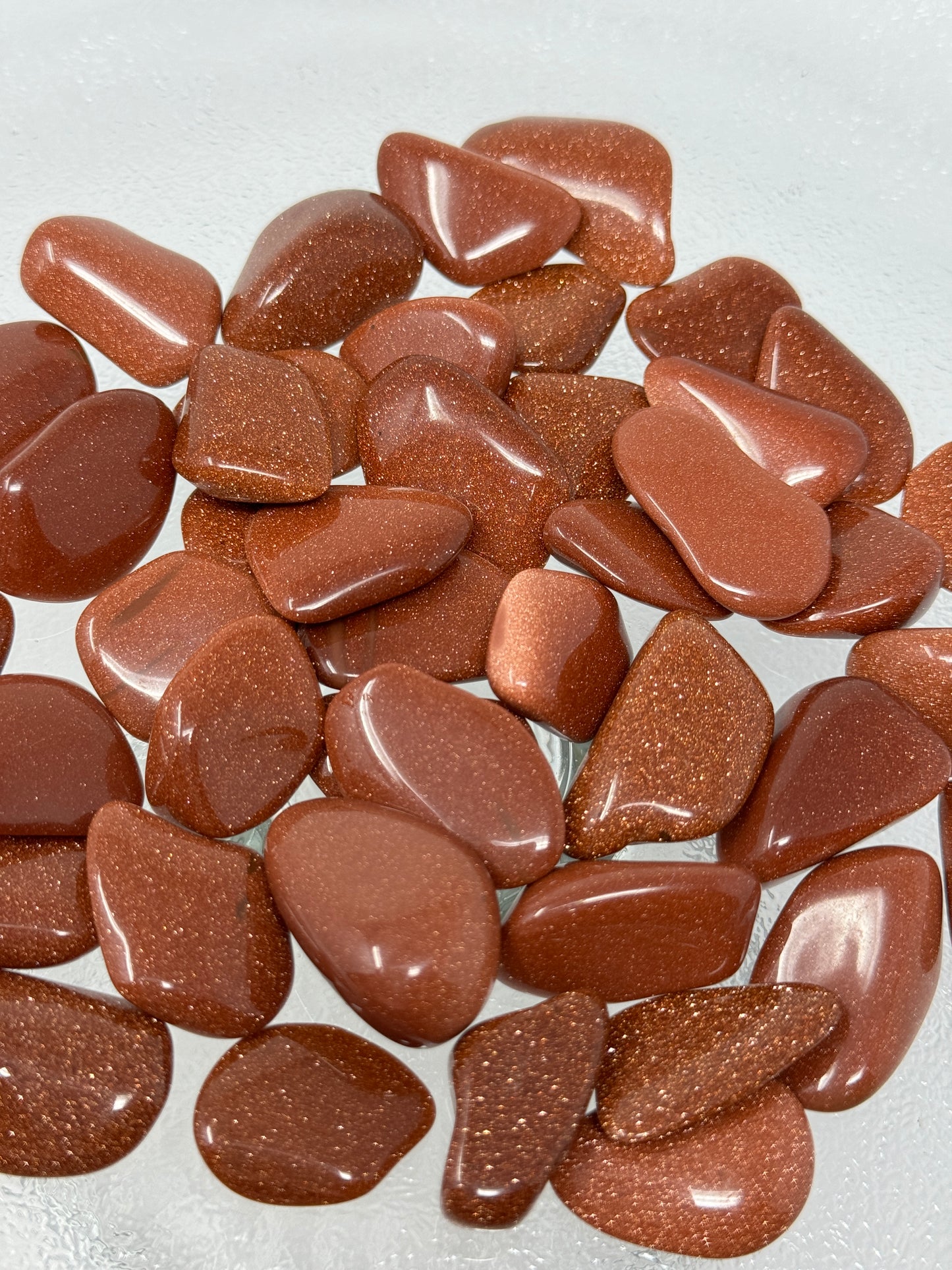 One Goldstone Tumbled Stone