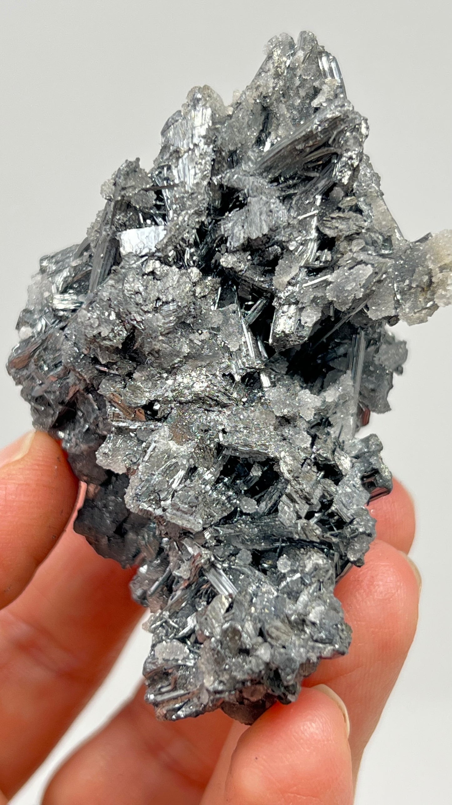 Prismatic Stibnite Cluster with Chalcedony Druse