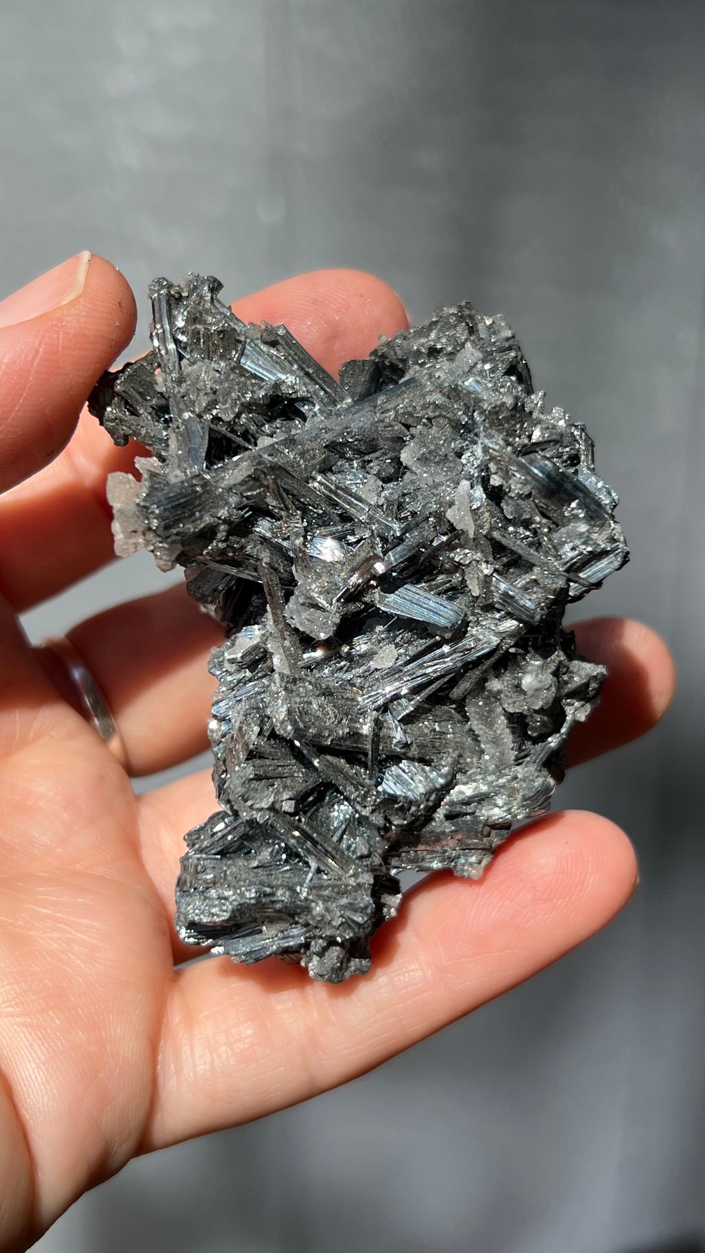 Prismatic Stibnite Cluster with Chalcedony Druse