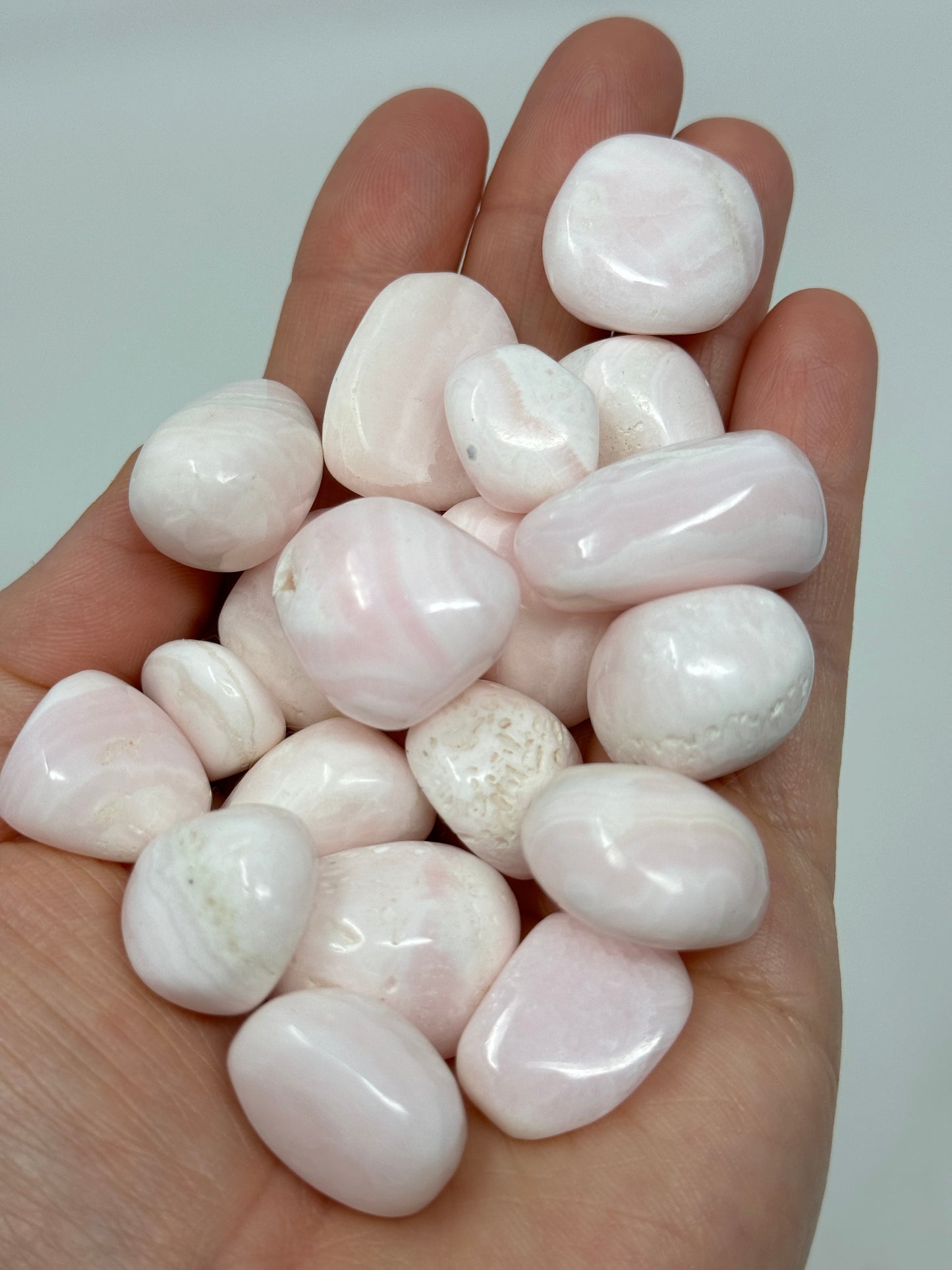 One Mangano Calcite Tumbled Stone UV Reactive